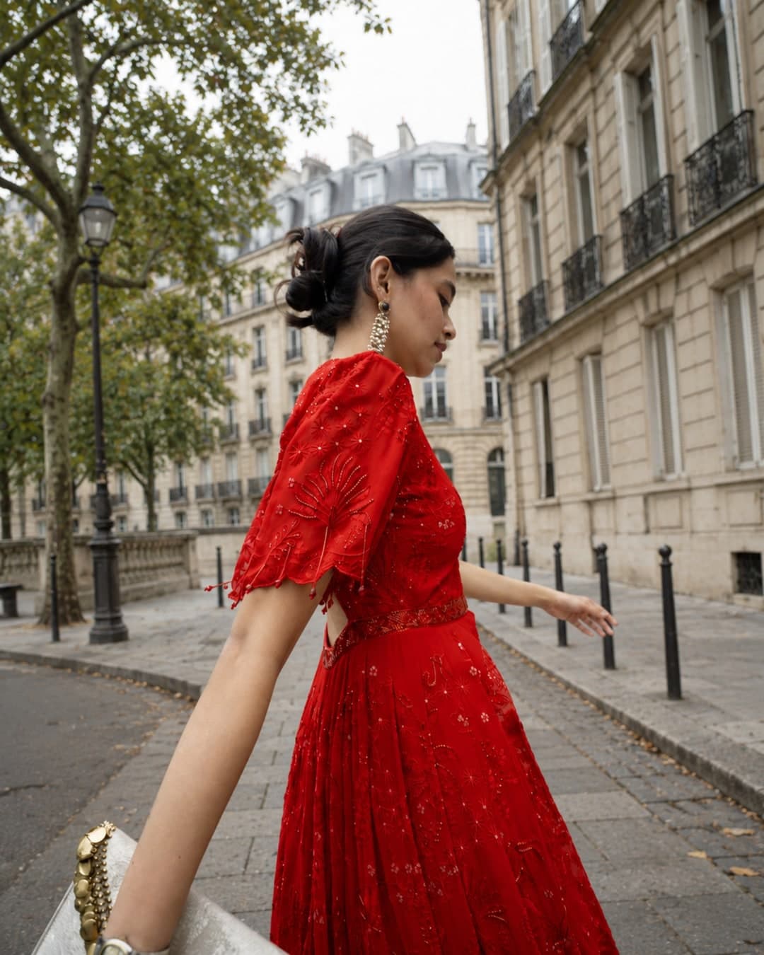 Kate anarkali in red, close view of the bell sleeve and katdana embroidery