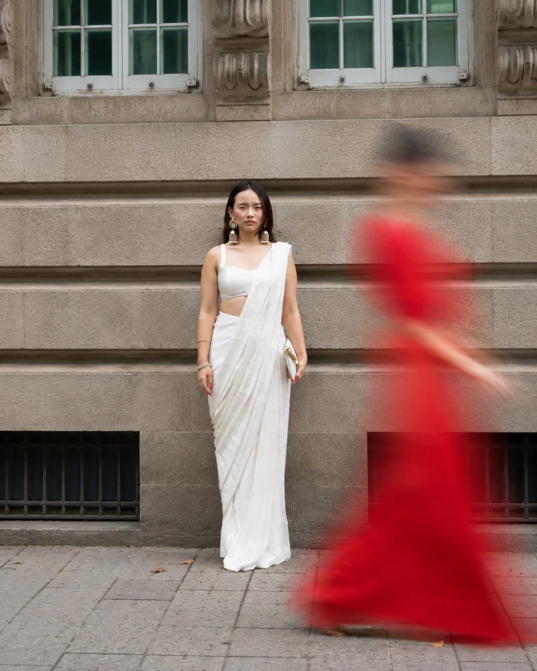 Gigi pre-draped saree in ivory and gold, photographed on a Mumbai street